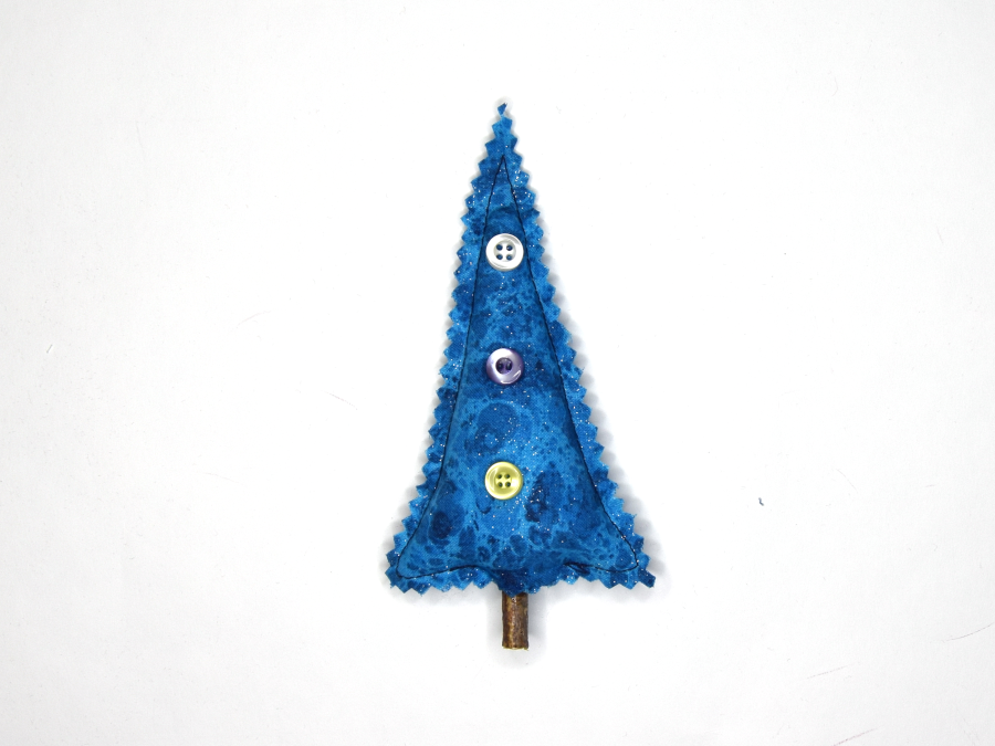 Tree with inserted stick and buttons