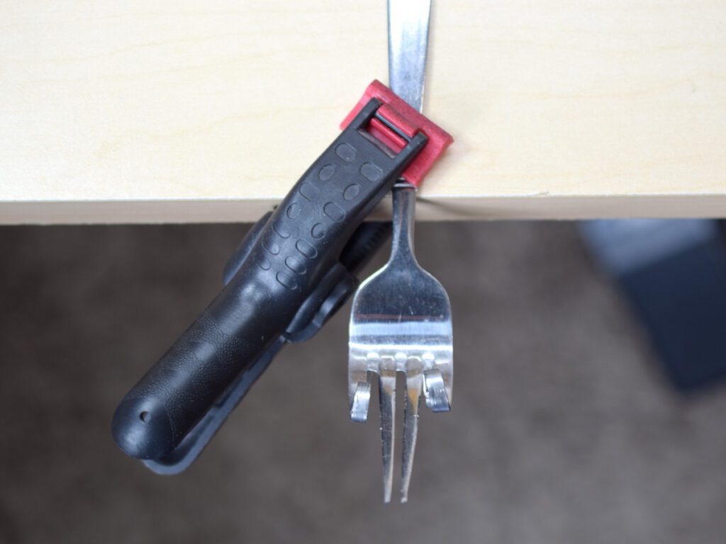 Fork for installing Zipper Pulls Clamped to table